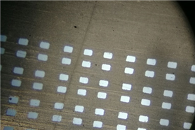 光电公司0.045*0.065mm纳米激光钢网放大100倍效果图